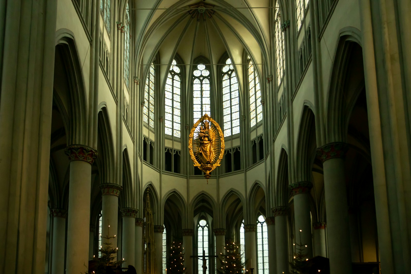 a large cathedral with a chandelier hanging from the ceiling