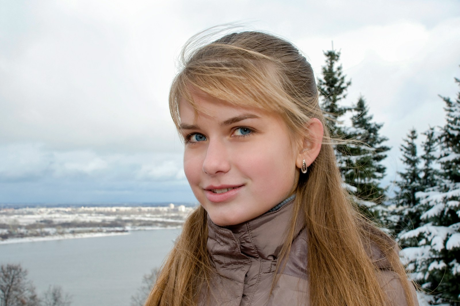 girl in gray jacket smiling