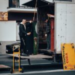 a person standing in a doorway of a building